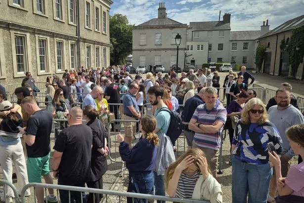 Emotional scenes as thousands queue to pay respects to Glen Hansard at public wake