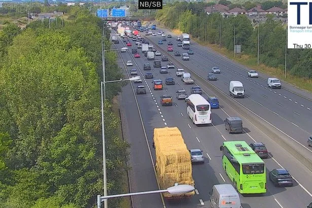 Overturned trailer and M50 collision add to delays - live updates