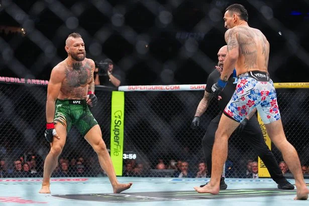Conor McGregor loses to Max Holloway in 69 seconds after suffering knee injury on UFC return