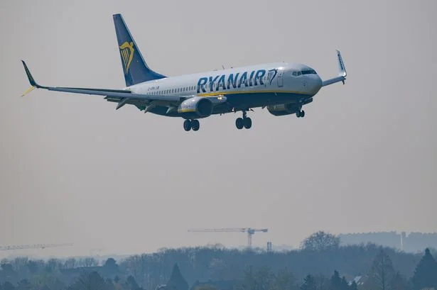 Horror as Ryanair passenger on Greece flight 'sucked through dislodged window' as 'wife clings onto