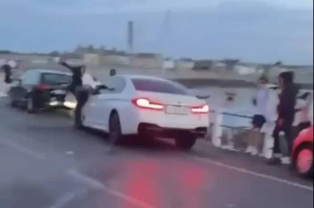 Man charged over incident where car driven at group leaving three hospitalised